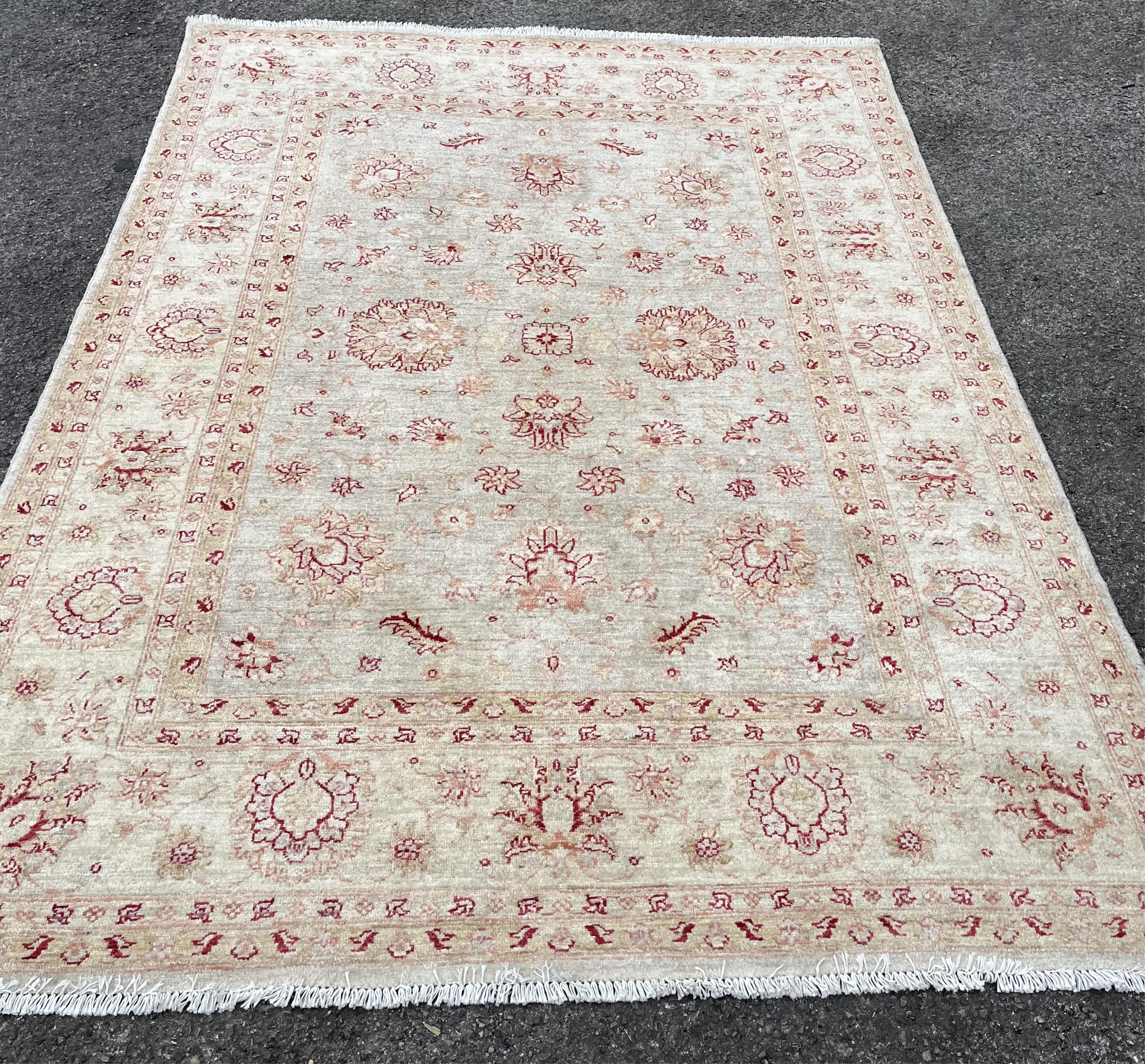 A Ziegler style ivory ground carpet, 240 x 173cm. Condition - good